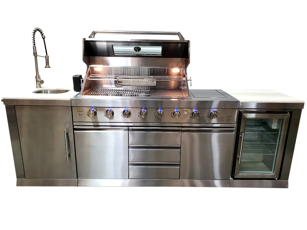 Outdoor grill with sink outlet